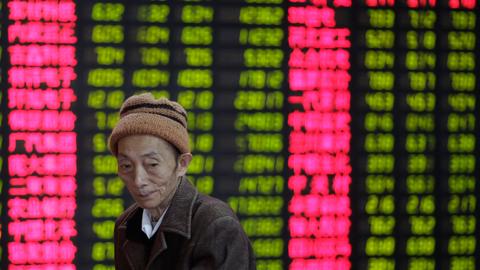 Asian stocks mixed after US, China impose new tariff hikes