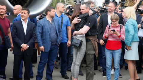 Russia, Ukraine swap prisoners in landmark 'first step' to ease tensions