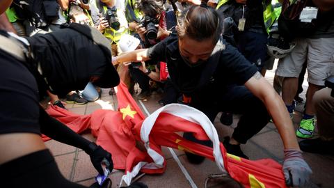 Demonstrators march in Hong Kong in new weekend of protest