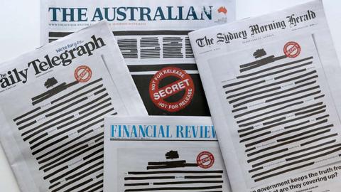 Australian papers redact front pages to expose govt secrecy