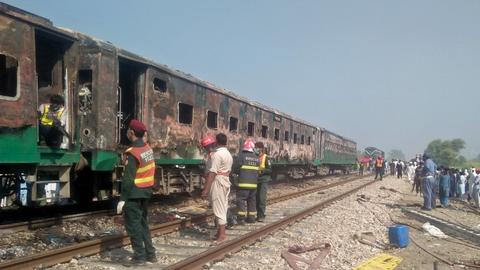 Fire on train in Pakistan kills at least 62 after gas canister explodes