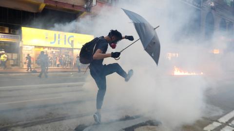 Hong Kong families oppose tear gas use on eve of polls
