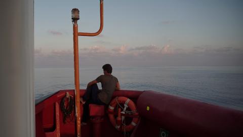 Italian coast guard rescues 149 migrants from capsized boat