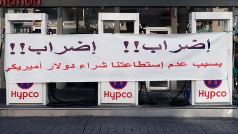 Lebanese block roads as petrol stations strike