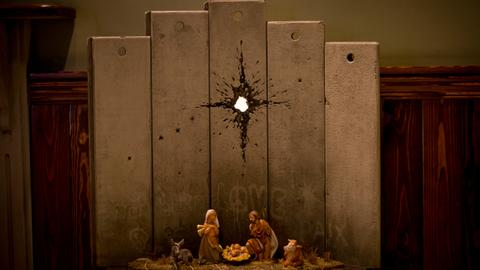Banksy's 'Scar of Bethlehem' nativity unveiled in West Bank hotel