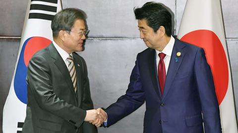 China hosts Japan, South Korea with eyes on nuclear North