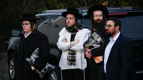 Suspect in court after five stabbed at New York rabbi's home
