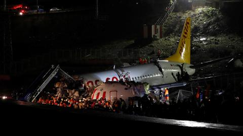 Plane skids off runway in Istanbul, breaks into three