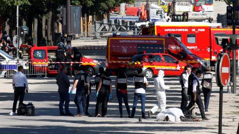 Driver dies after ramming car into police van in Paris
