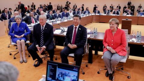 Millions place hope in G20, Merkel tells leaders