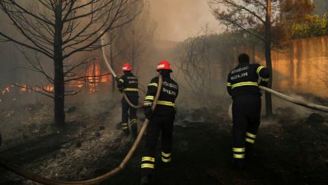 In Pictures: Wildfires in southern and central Europe 