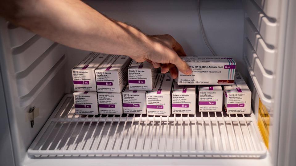 Staff member handles AstraZeneca Covid-19 vaccines in storage at Region Hovedstaden's Vaccine Center, Copenhagen, Denmark on 11, 2021.