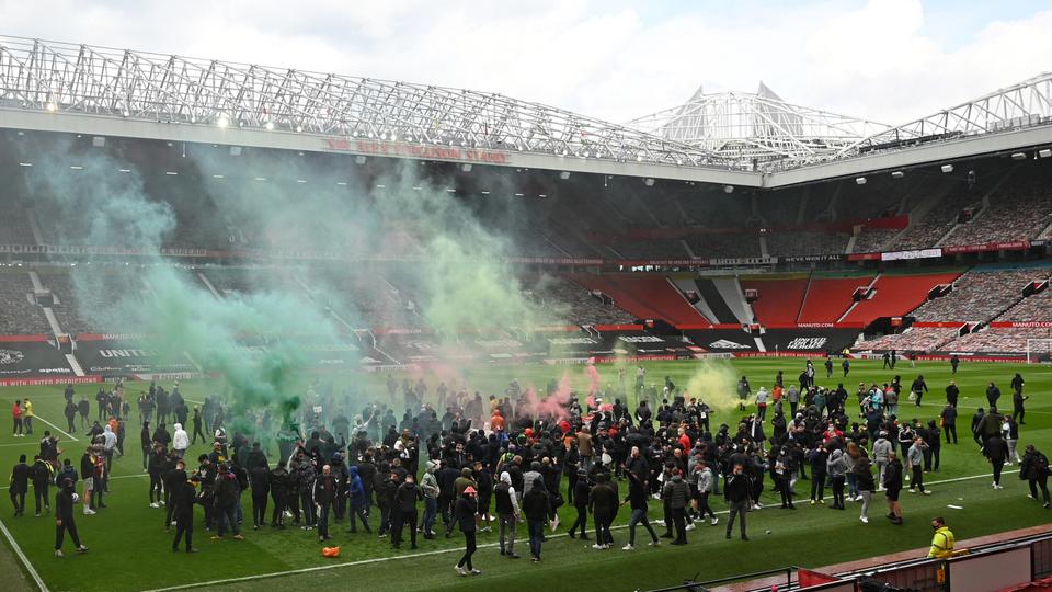 Match postponed as Man Utd fans invade Old Trafford in anti-Glazer protest