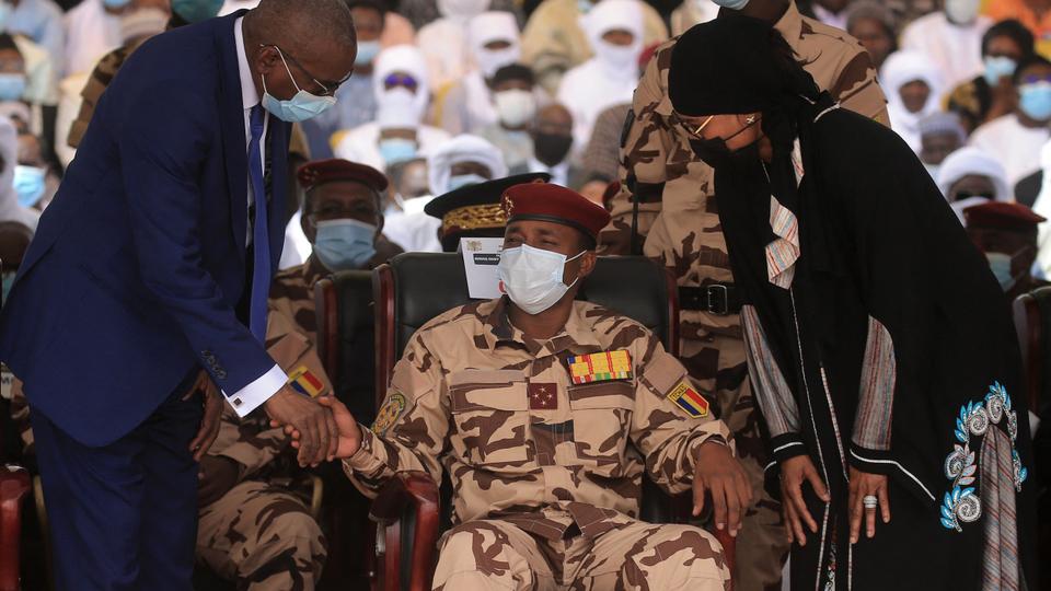 In this April 23, 2021 file photo the son of the late Chadian president Idriss Deby, general Mahamat Idriss Deby (C) sits in the front row as he attends the state funeral for the late Chadian president Idriss Deby in N'Djamena.