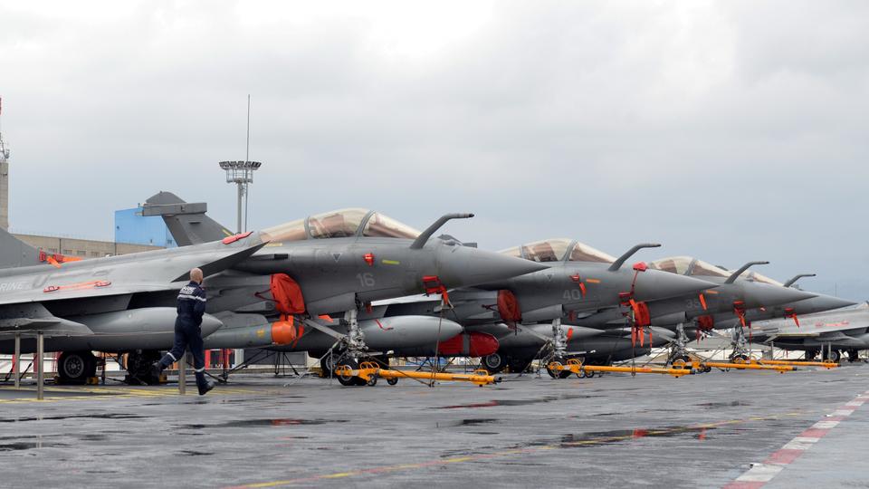 In this February 21, 2020 file photo, French Navy Rafale fighter jets are seen onboard the Charles de Gaulle aircraft carrier.