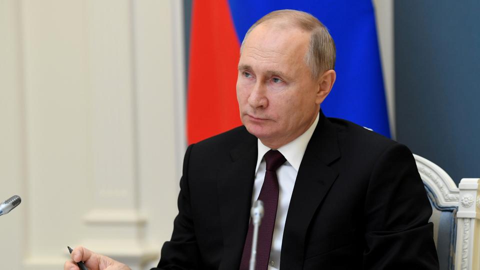 Russian President Vladimir Putin attends a meeting via video link in Moscow, Russia December 21, 2020.