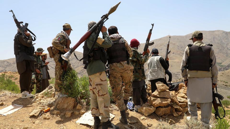 Afghan soldiers and pro-government militia prepare to fight the Taliban in Ghorband District, Parwan Province, Afghanistan on June 29, 2021.