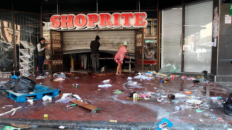 Pic caption: The trashed entrance to a supermarket in Durban, South Africa on July 15, 2021.