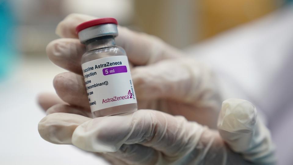 A health worker shows a vial of the AstraZeneca Covid-19 vaccine, Pathum Thani, Thailand, June 7, 2021.