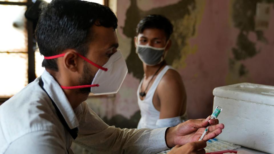 A health worker prepares to administer the vaccine for Covid-19 in New Delhi, India on Aug. 24, 2021