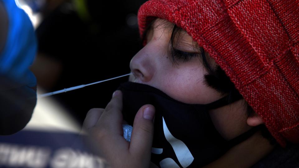 A young boy is tested for the coronavirus disease (COVID-19) at a mobile testing site as the country sees an increase in children infected with Covid-19, in Houston, Texas, US, on August 16, 2021.