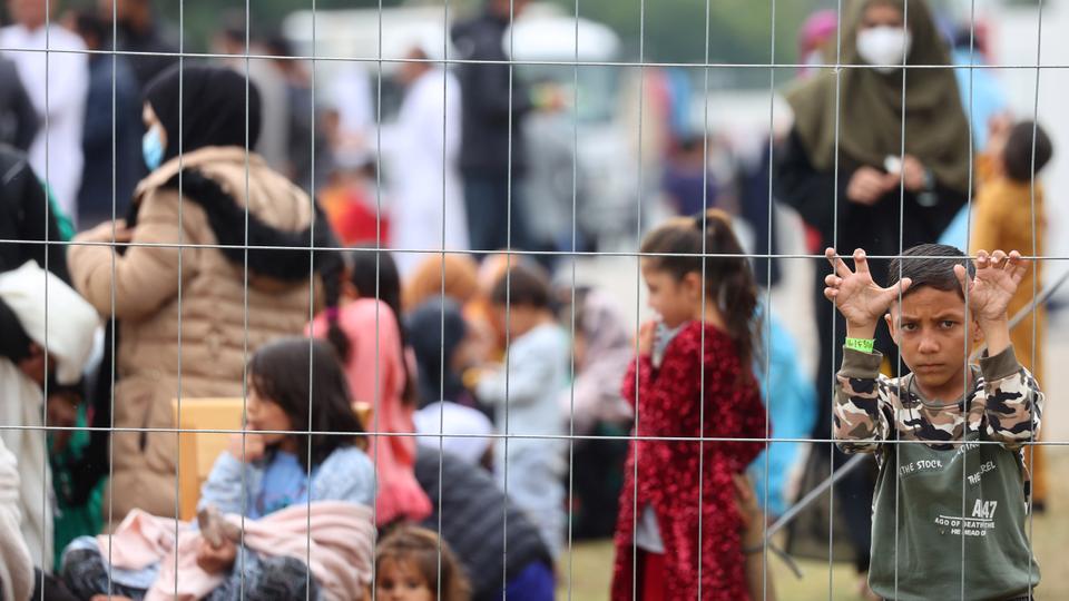 Evacuees from Afghanistan are seen at their temporary shelter inside the US Army Rhine Ordonanz Barracks in Kaiserslautern, Germany, August 30, 2021.