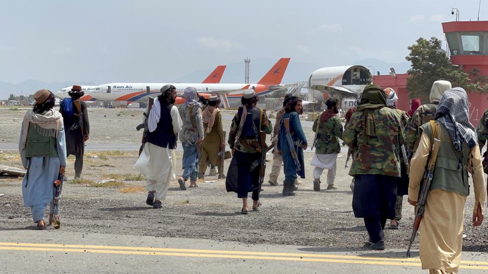 Taliban forces patrol at a runway a day after US troops' complete withdrawal from Kabul airport in Afghanistan, on August 31, 2021.