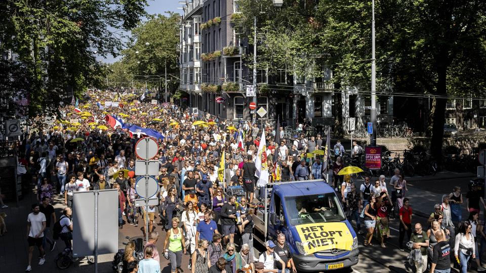 Thousands protest against Covid curbs in Amsterdam – latest updates