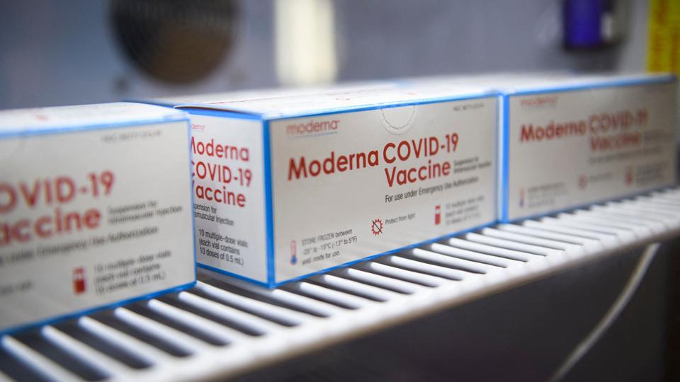 This file photo shows boxes containing vials of the Moderna Covid-19 vaccine stored at the Kedren Community Health Center in Los Angeles, California.