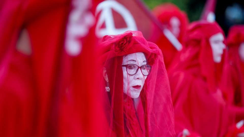 The demonstrators carried colourful placards, played drums and danced as they demanded world leaders save the planet.