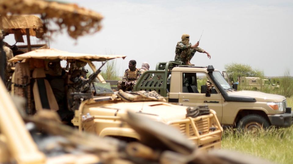 Malian soldiers are pictured during a patrol with soldiers from the new Takuba force near Niger border in Dansongo Circle, Mali on August 23, 2021.