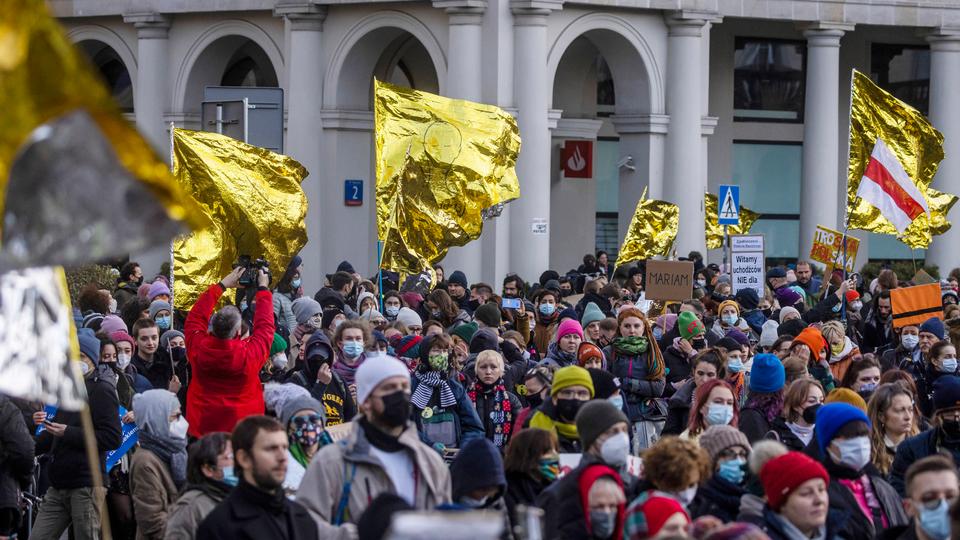 Rights groups have criticised Poland's nationalist government over its treatment of migrants and refugees with accusations of failure to provide food and shelter.