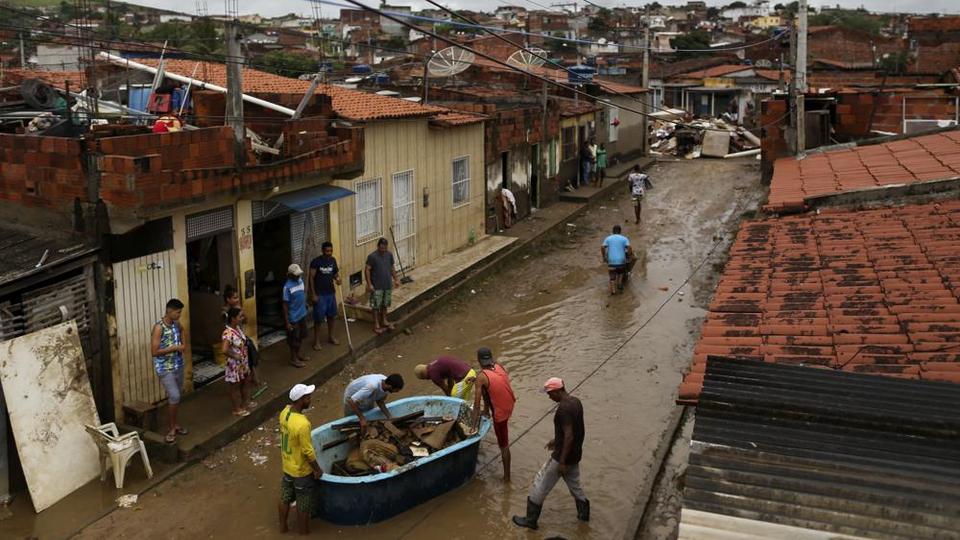 Two dams also broke in northeastern Brazil, threatening worse flooding in a rain-drenched region that has already seen thousands of forced to flee their homes.