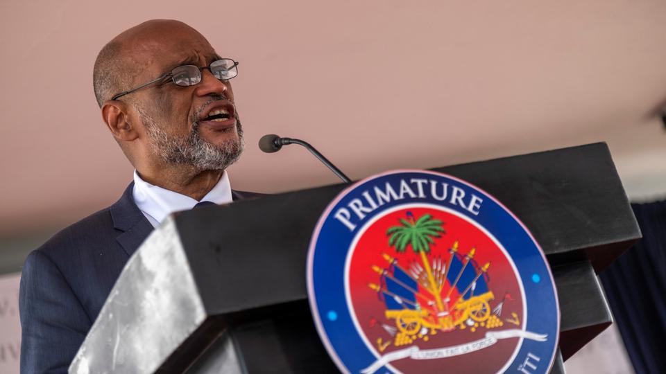 Haiti prime minister's office says arrest warrants have been issued for the suspects who fired on Henry's convoy.