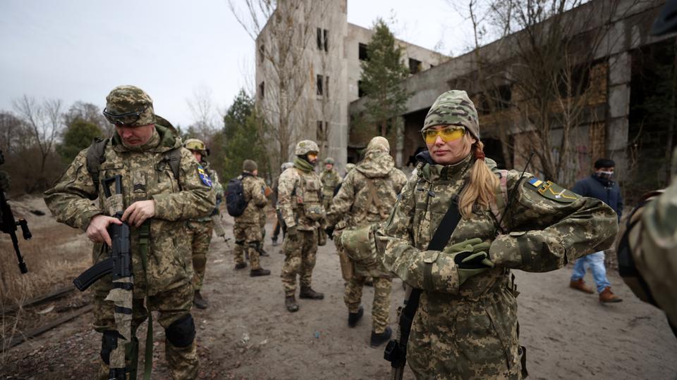 Civilians receive military training at an old industrial plant in Desnianskyi, Ukraine on February 19, 2022, as Ukraine-Russia standoff continues.