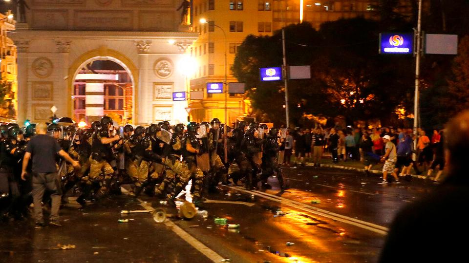 Police confront protesters at the parliament building in Skopje, North Macedonia, late Tuesday, July 5, 2022.