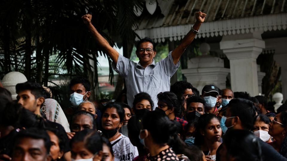 Protesters storm the colonial-era presidential palace a day earlier.