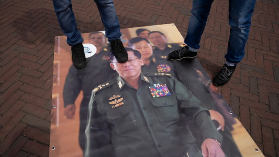 Demonstrators outside The Hague on July 22 step on an image of Myanmar's military ruler Min Aung Hlaing.