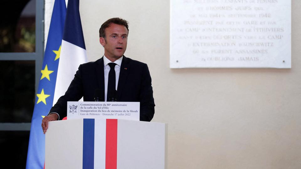 France's President Emmanuel Macron delivers a speech during the inauguration of the Pithiviers station memory centre after its rehabilitation as a new Shoah memorial site, in Pithiviers on July 17, 2022, as part of the ceremonies commemorating the 80th anniversary of the Vel d'Hiv roundup.