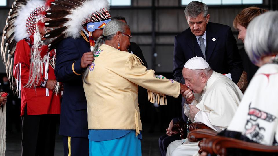 Francis, in a wheelchair, exited the back of his plane with the help of an ambulift before being driven in a compact white Fiat to an airport hangar where he was greeted by Trudeau, Simon and other dignitaries.