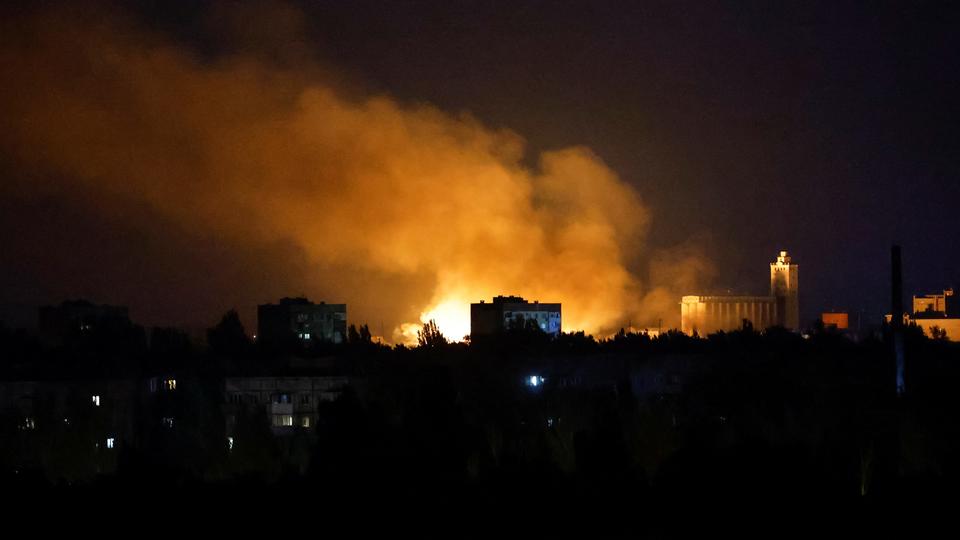 Smoke rises after the shelling of a brewery during the Ukraine-Russia fighting in the city of Donetsk.