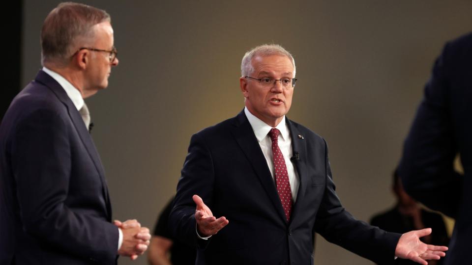 Then Prime Minister of  Australian Scott Morrison, right, and  Labour Party leader Anthony Albanese take part in a debate in Brisbane on April 20, 2022.