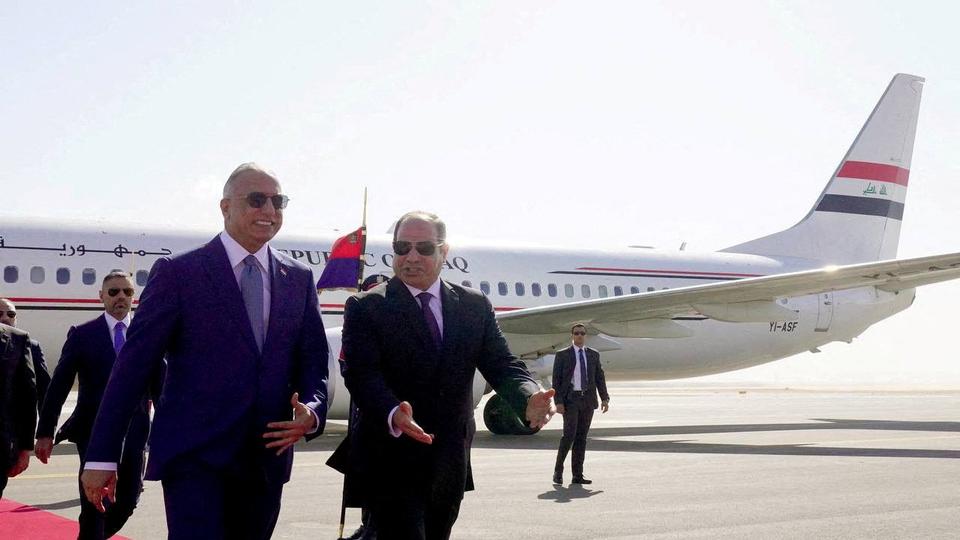 Egyptian President Abdel Fattah al Sisi receives Iraqi Prime Minister Mustafa al Kadhimi upon his arrival in the Mediterranean city of Al Alamein, Egypt on August 22, 2022.