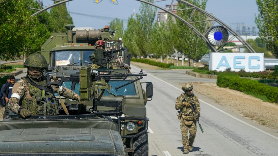 A Russian military convoy is seen on the road toward the Zaporizhzhia Nuclear Power Station in Enerhodar, Zaporizhzhia region in territory under Russian military control in southeastern Ukraine, on May 1, 2022.