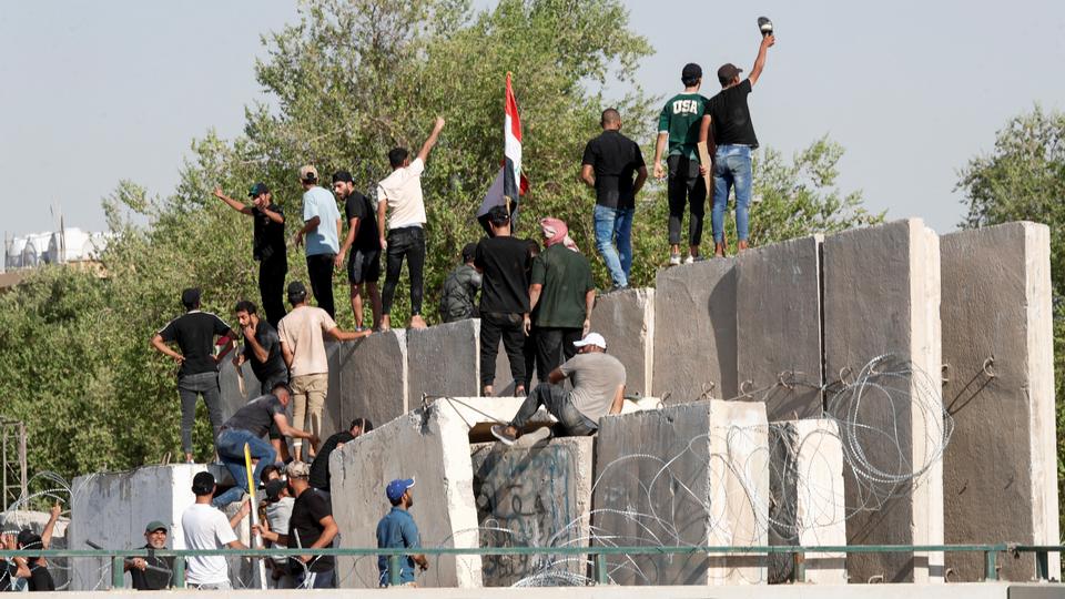 Supporters of Iraqi cleric Muqtada al Sadr breach the Green Zone in Baghdad, Iraq on August 29, 2022.