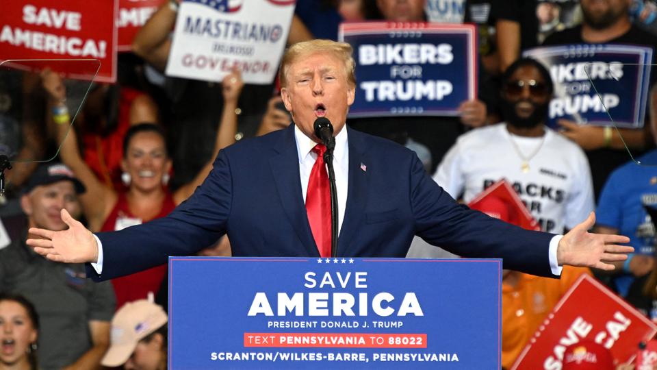 Donald Trump speaks during a campaign rally in support of Doug Mastriano for Governor and Mehmet Oz for US Senate at Mohegan Sun Arena in Pennsylvania.