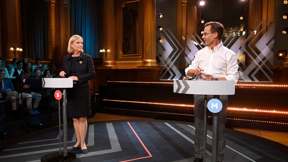 Andersson (L) met her opponent Ulf Kristersson (R), leader of the Moderate Party, during a debate in Stockholm.