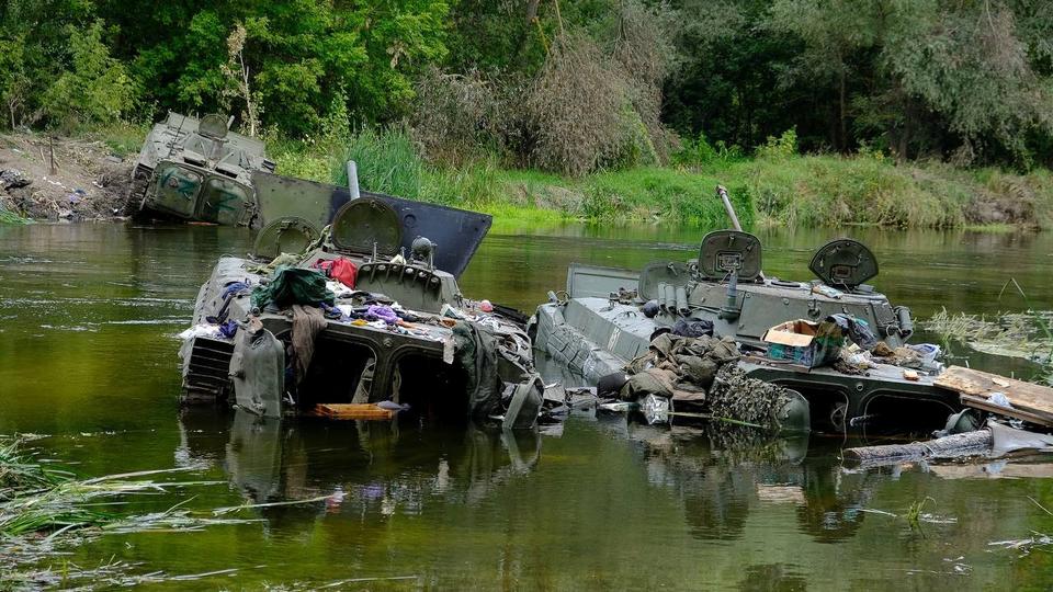 Crates of dumped munitions and abandoned military hardware could be seen scattered in territory left by the Russian forces.