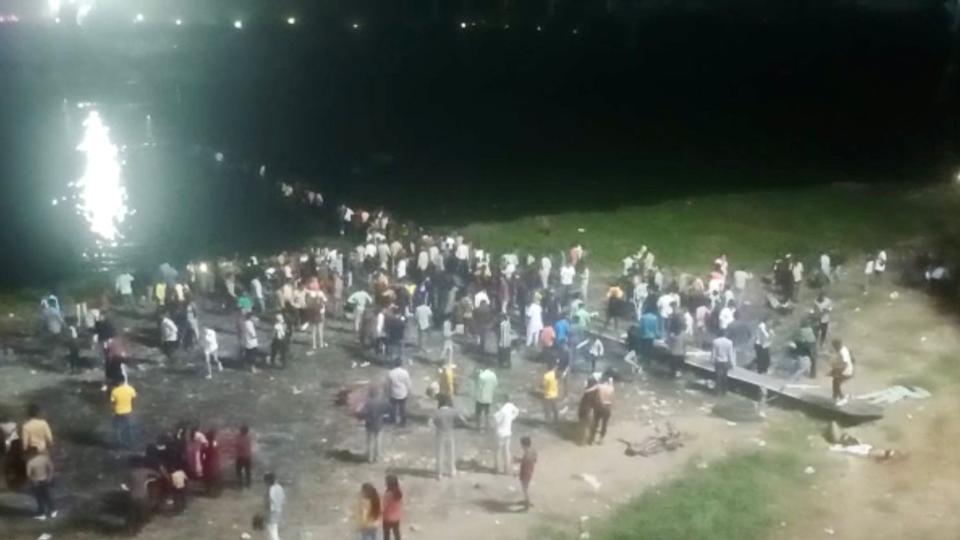 Death toll in India suspension bridge collapse nears 100