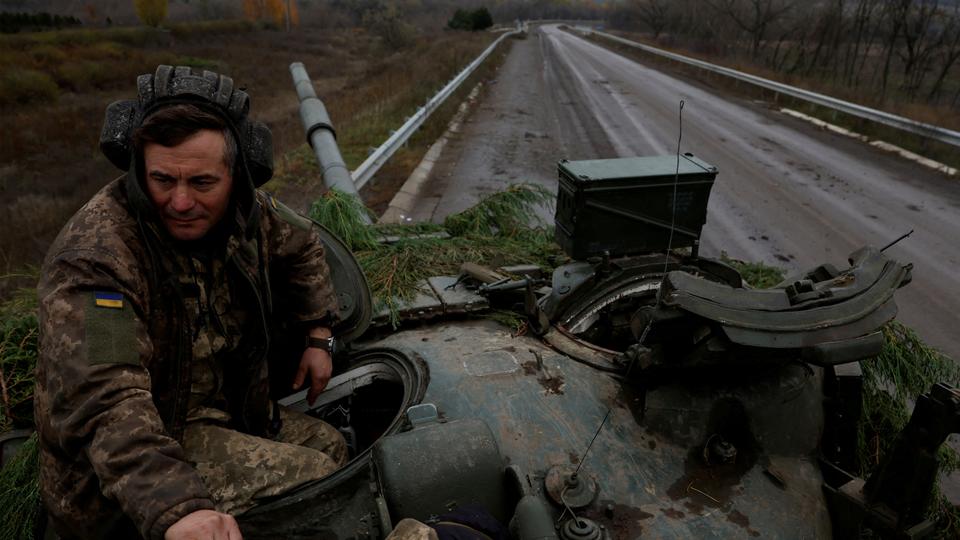Ukrainian soldiers prepare to fire a round on the frontline from a captured Russian T80 tank, in eastern Bakhmut area.